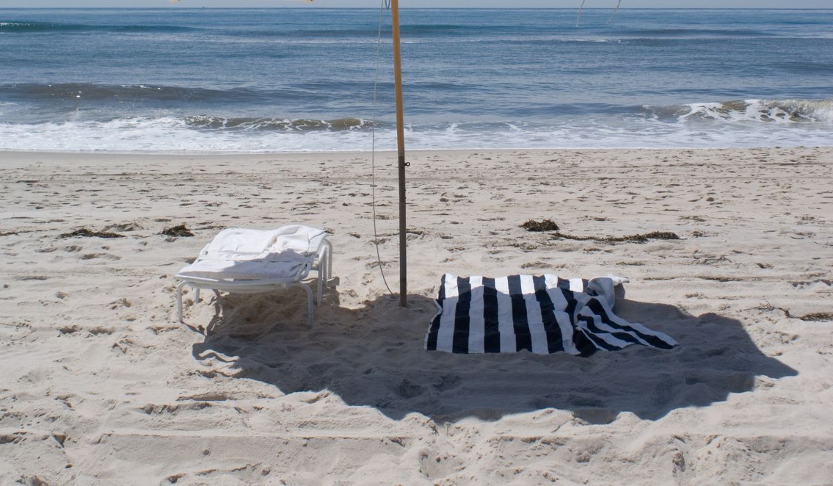 Doblar toalla playa